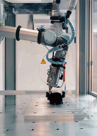 Automation Line with precision robot arm dispensing material