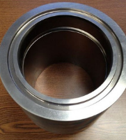 Close-up of a precisely machined metal part. Metal fabrication services offered at SC Industries, Houston.